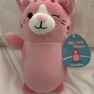 NEW Squishmallows HugMees 10” Inch Geraldine the Pink Tabby Cat Kitty Winking