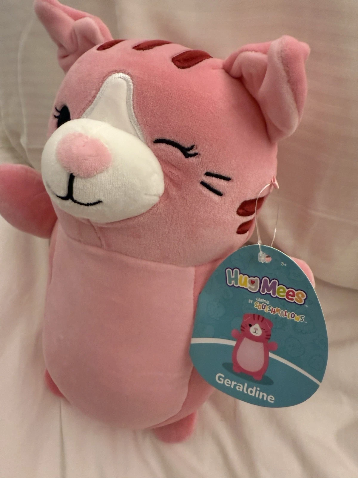 NEW Squishmallows HugMees 10” Inch Geraldine the Pink Tabby Cat Kitty Winking - Image 3
